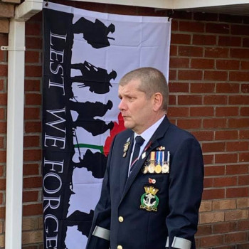 Norwich Branch Member Observing 2 Minutes Silence On Doorstep
